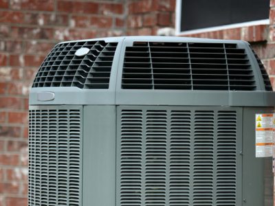 High efficiency air conditioner on brick wall background