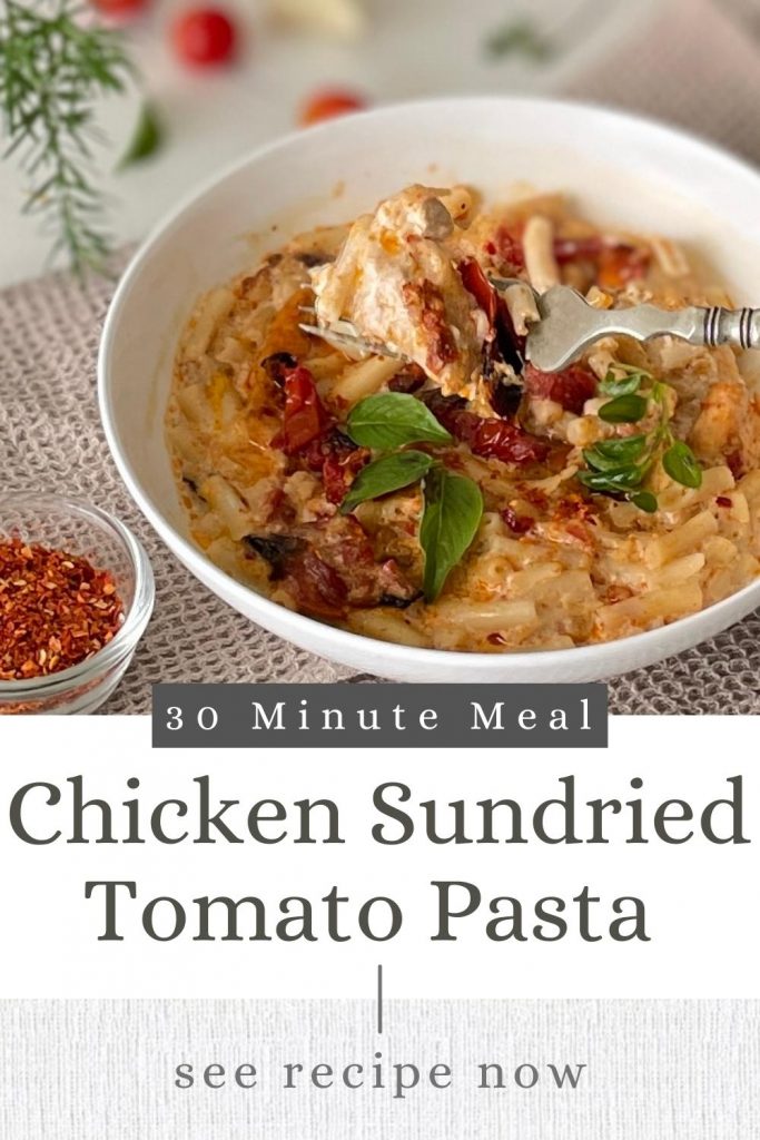 chicken sundried tomato pasta in a white bowl